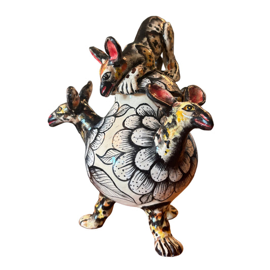 Decorative ceramic wild dogs with intricate patterns 