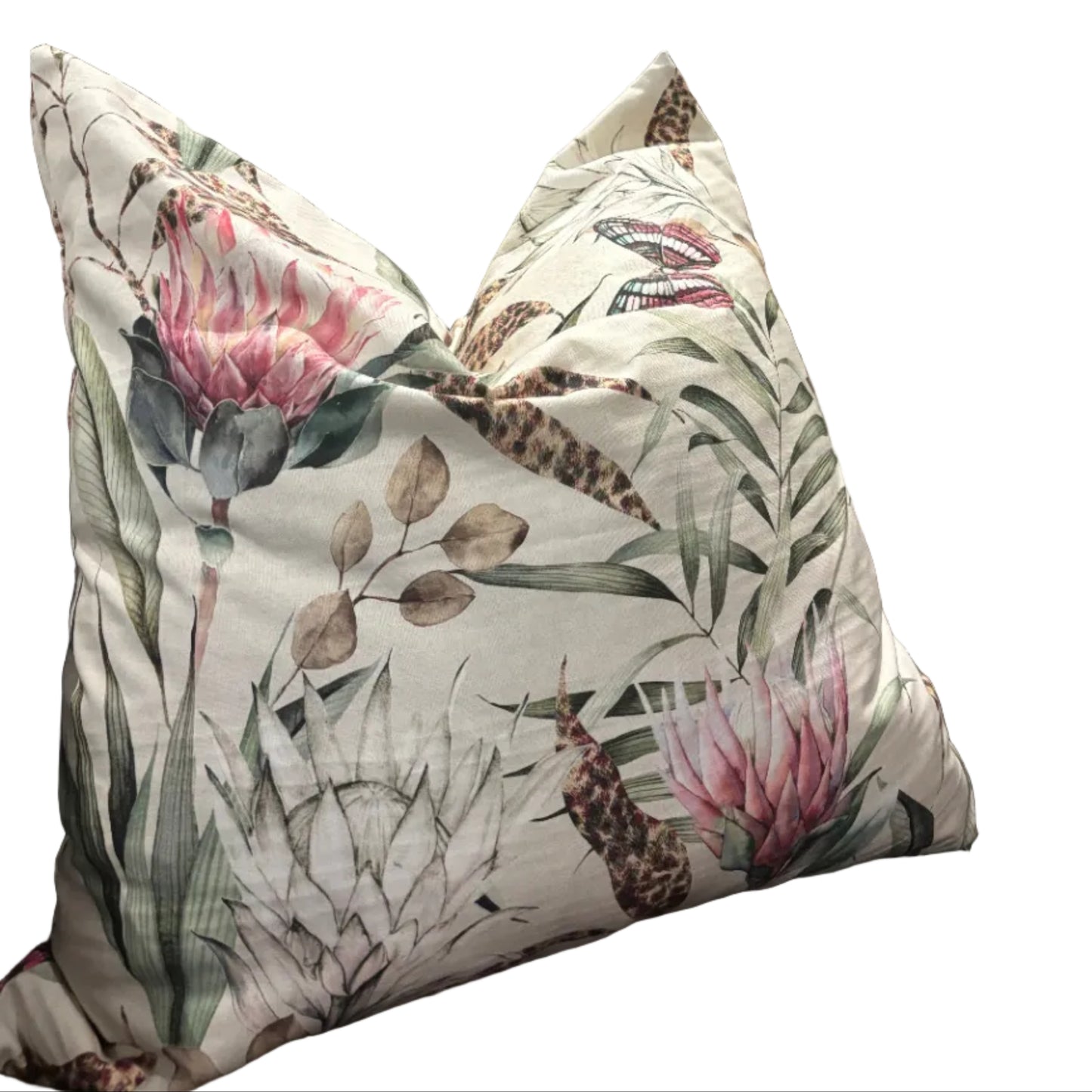 Floral-patterned pillow on a sofa