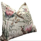 Floral-patterned pillow on a sofa