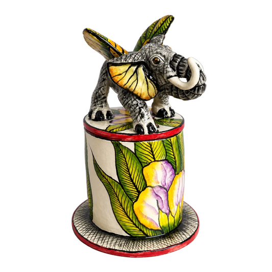 Elephant atop a lid of a trinket jar