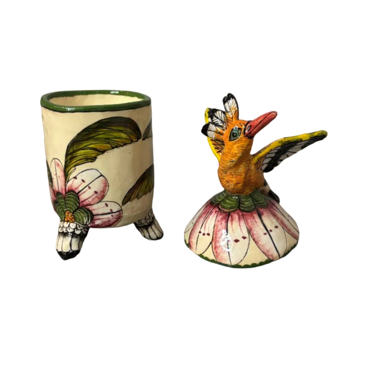 Decorative container with a lid. Atop the lid sits a bird.  Hand painted florals. Ceramic art. Scented candle inside. 