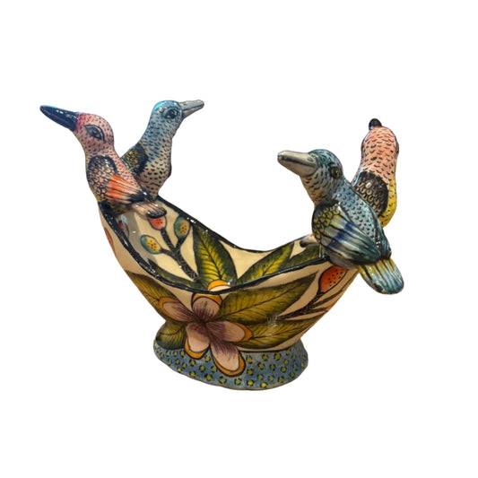 A decorative soap dish or trinket bow. Ceramic art featuring birds. Hand painted in bright florals.  