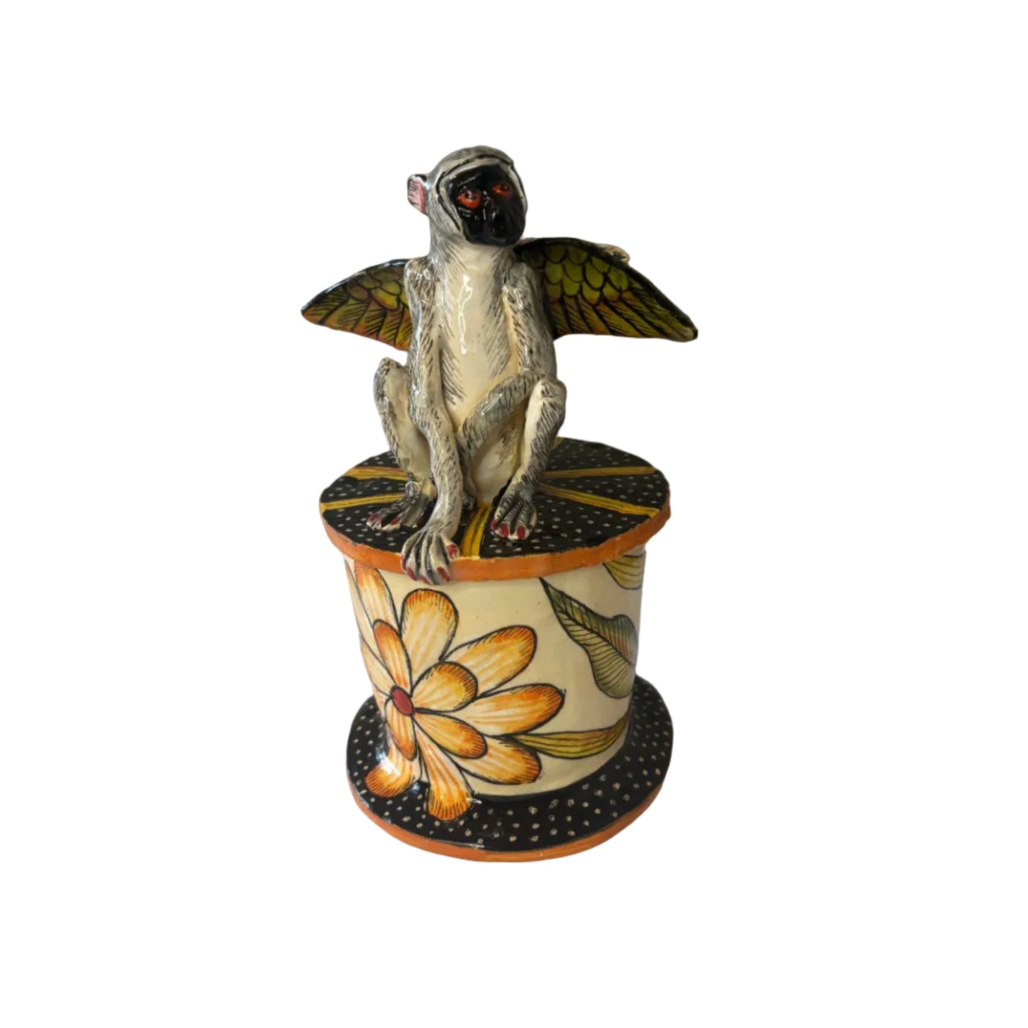 A playful meeting of art, nature and imagination, this handcrafted ceramic trinket box is topped with a wonderfully expressive winged monkey, bringing an unexpected touch of whimsy to the piece.